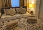 Location vacances  Donji Petrovci - Green Lux Apartment-1