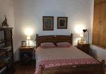 Location vacances Almonaster la Real - Charming house with mountain views in Alajar-1