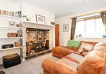 Location vacances Newton-by-the-Sea - Garden Cottage-1