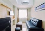 Location vacances Bogor - Homey and Minimalist 1br Royal Sentul Park Apartment By Travelio-3