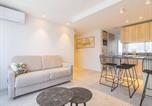 Location vacances  Marne - Élégant Appartement Moderne à Reims avec Climatisation - Fr-1-870-13-3