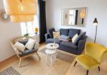 Location vacances  Gare de Wismar - Nikolaiblick Loft mit Klimaanlage - Abc292-1