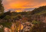 Location vacances Hilders - Blockbohlen Holzhaus mit Sauna, Outdoor Jacuzzi und Badeteich-2