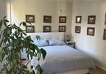 Location vacances  Province de Parme - Beautiful Center Apartments - posti auto privati prenotabili-2