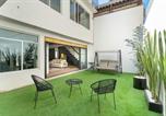 Location vacances Cuautitlan Izcalli - Spacious Home Ideal for Groups with Patio & Arcade-4