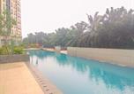 Location vacances Bogor - Modern Living and Nice Studio at Transpark Cibubur Apartment By Travelio-2