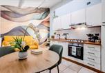 Location vacances  Province de Parme - Casa Mameli in The Heart of City-1
