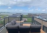 Location vacances North Holland - Enkhuizer Strand Cube Elite Paradiso mit Zaun Haus Nr 211-4