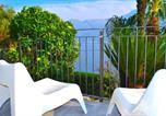 Location vacances  Province de Côme - Apartment The Palm with Garden-3