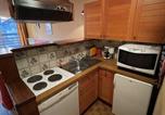 Location vacances  Cantal - Appartement cosy avec balcon au cœur de la station - Fr-1-787-78-4