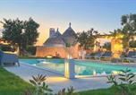 Location vacances Castellana Grotte - Td Trulli della Rosatella Typical Trulli w Pool-1