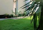 Location vacances  Province de Monza et de la Brianza - Orelli House - Bilocal Garden New-1