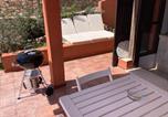 Location vacances  Province de Cagliari - Villasimius Il patio sul porto-2