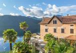 Location vacances  Province de Novare - Casa delle Palme con terrazza sul lago e spiaggia-1