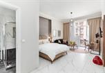 Location vacances  Pella - Black Onyx Comfort Suites - Elegant Stay- City Center Next to Airport Bus-1