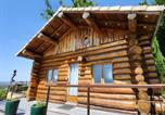 Location vacances Montmurat - Chalet de rêve en rondins avec Spa-1