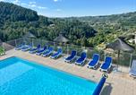Camping Saint-Privat - Camping Ushuaïa Villages Les Pins d'Ucel