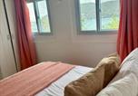 Location vacances  Palm Island ou Ile Prune - Trinity Point Hillside Villa, beach & sunset views-4