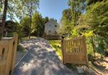 Location vacances Érezée - Luxury chalet with sauna in the forest-1
