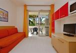 Location vacances  Province d'Udine - Bright getaway flat with pool-1