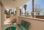 Location vacances  Province de Sassari - Waterfront Alghero Apartment-3