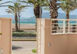 Location vacances  Province de Sassari - Waterfront Alghero Apartment-1