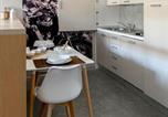 Location vacances  Ville métropolitaine de Turin - Ampio Monolocale - 4 ospiti con Garage nei dintorni a pagamento-3
