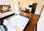 Location vacances Oerlenbach - Aparthotel - Stadtvilla Premium-4