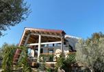 Location vacances  Province de Chieti - La Casa tra gli Ulivi - Cottage in legno-1