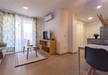 Location vacances  Alicante - Apartamento moderno con piscina comunitaria cerca del aeropuerto-4