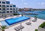 Location vacances Oranjestad - Stylish luxury condo, central location, ocean view, pool, gym-2